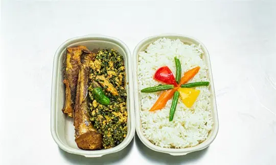 Rice with Nkontomire Stew.webp